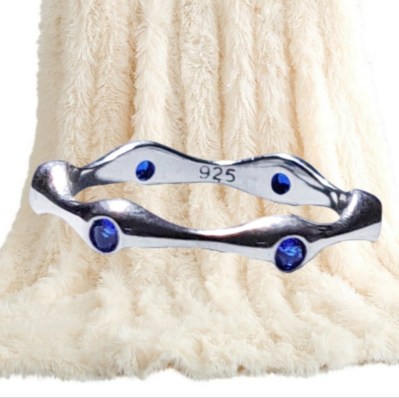 Jewelry - Sterling Silver Spiral Ring with Blue CZ Stones